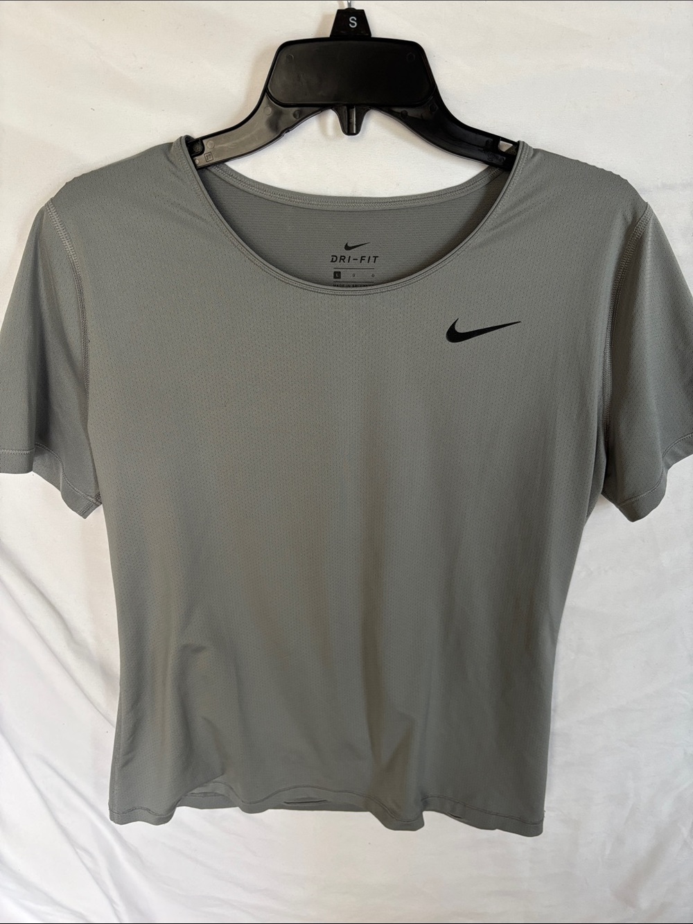 Nike Women's Short-Sleeve Dri-FIT Tee in Gray with Black Swoosh
